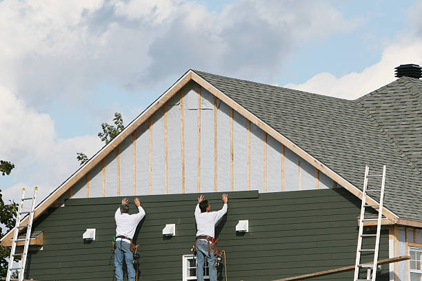 Professional Siding Replacement technician working in Boxborough, MA